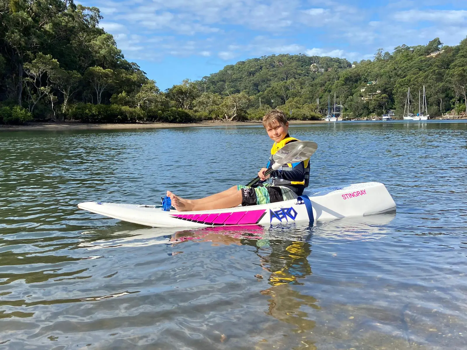 Little boy in a kayak