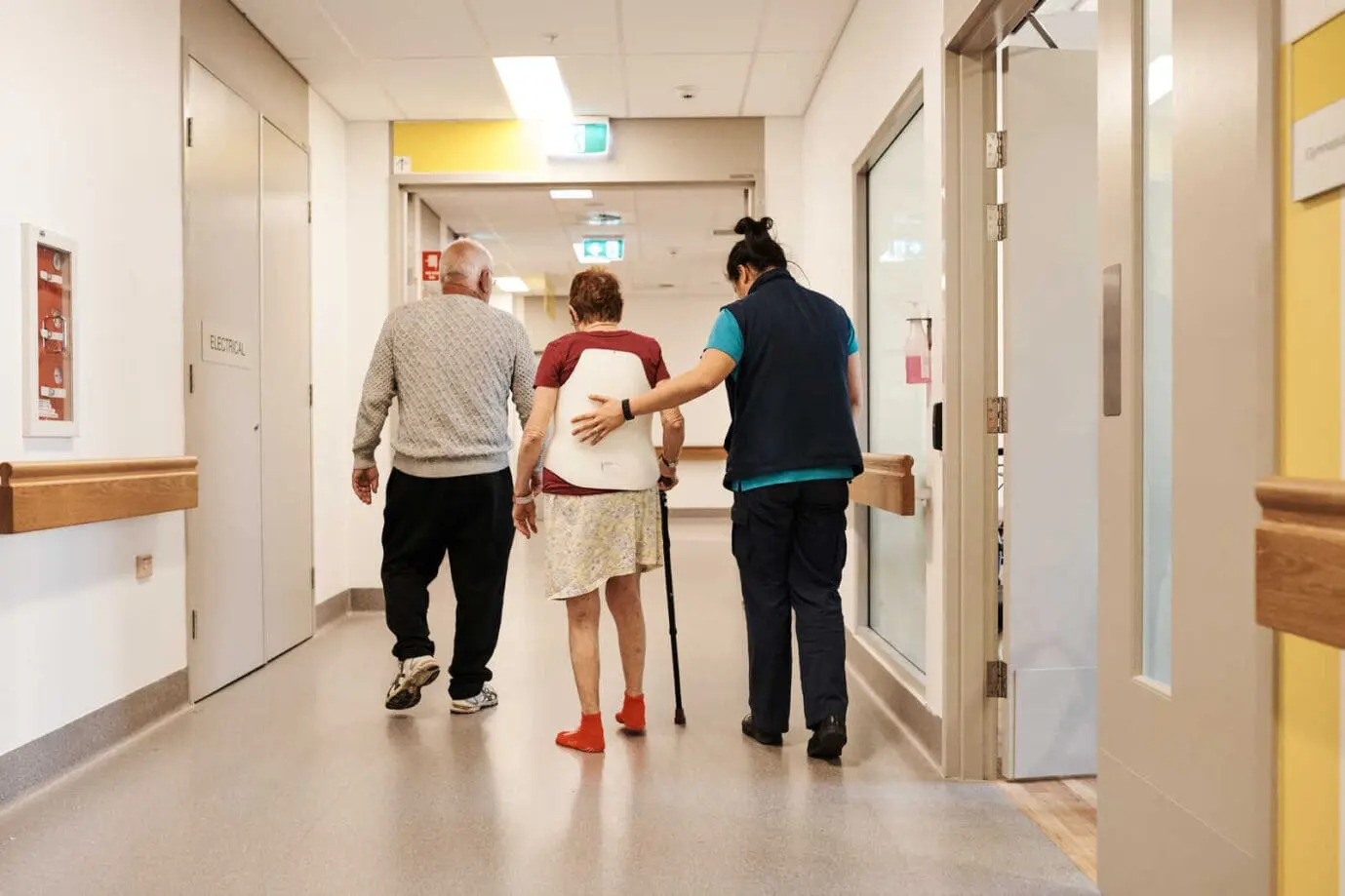 Nurse with elderly woman and husband