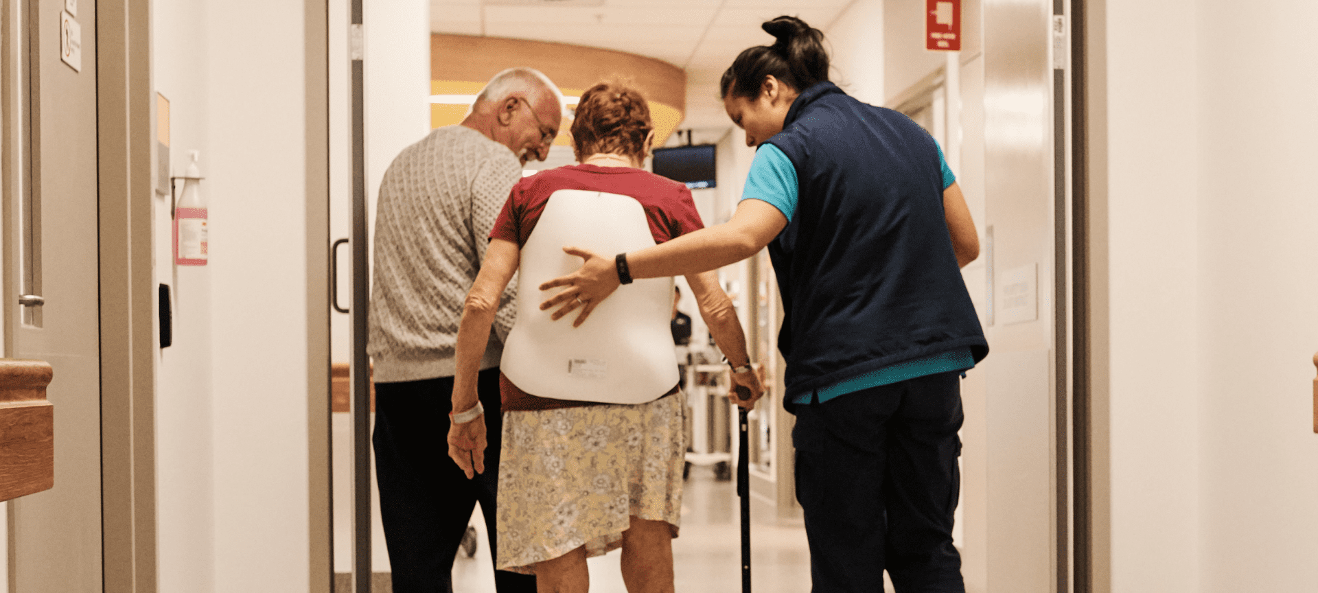 Male nurse taking care of older patient