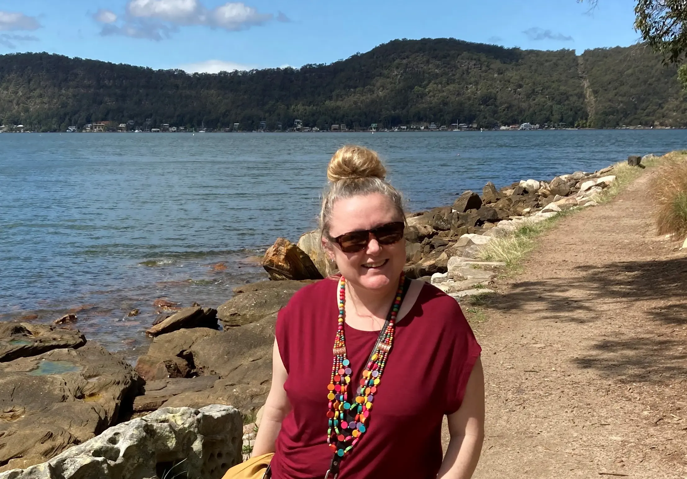 Woman standing by the beach