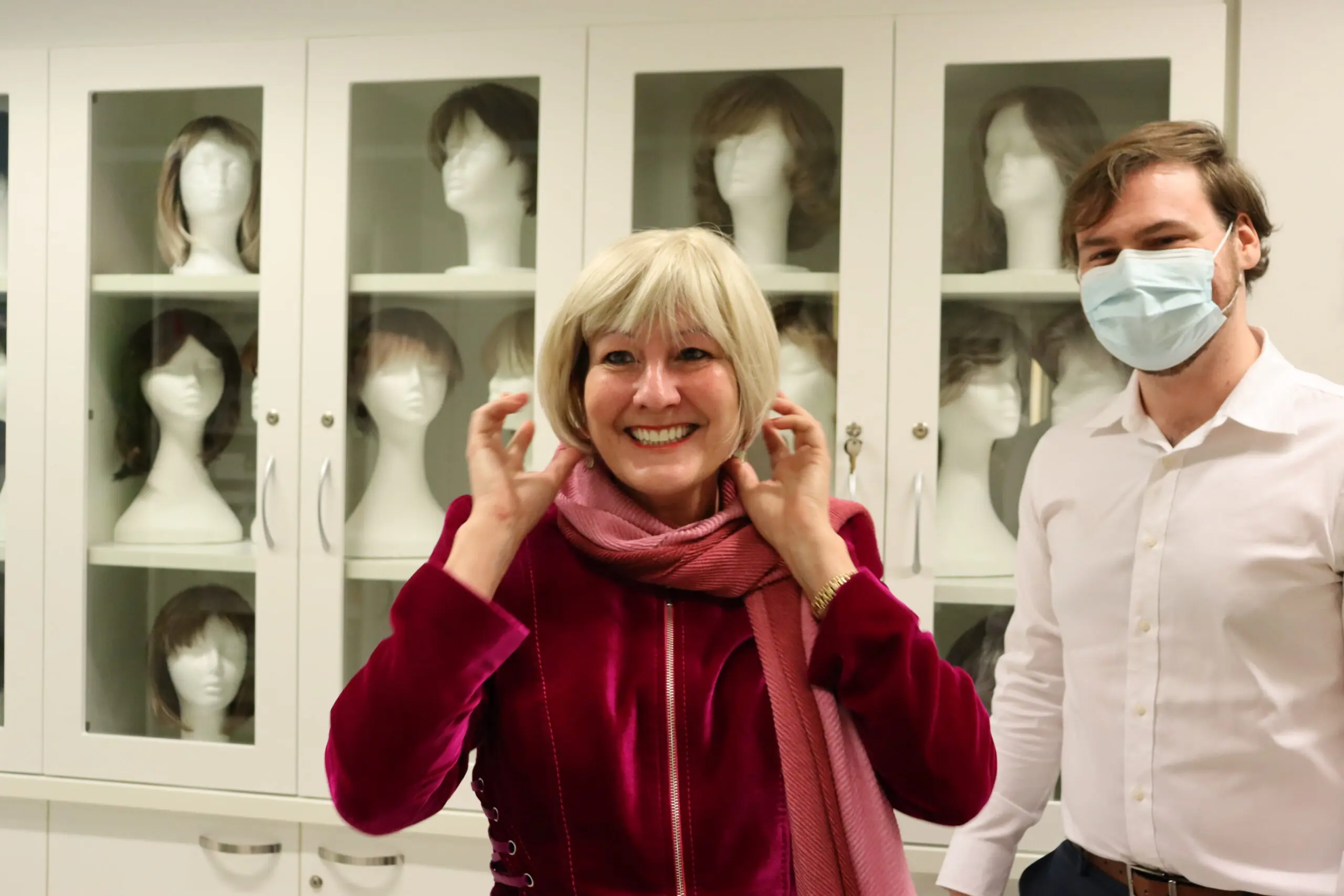 Lady trying a wig at the NSCC Wig Library