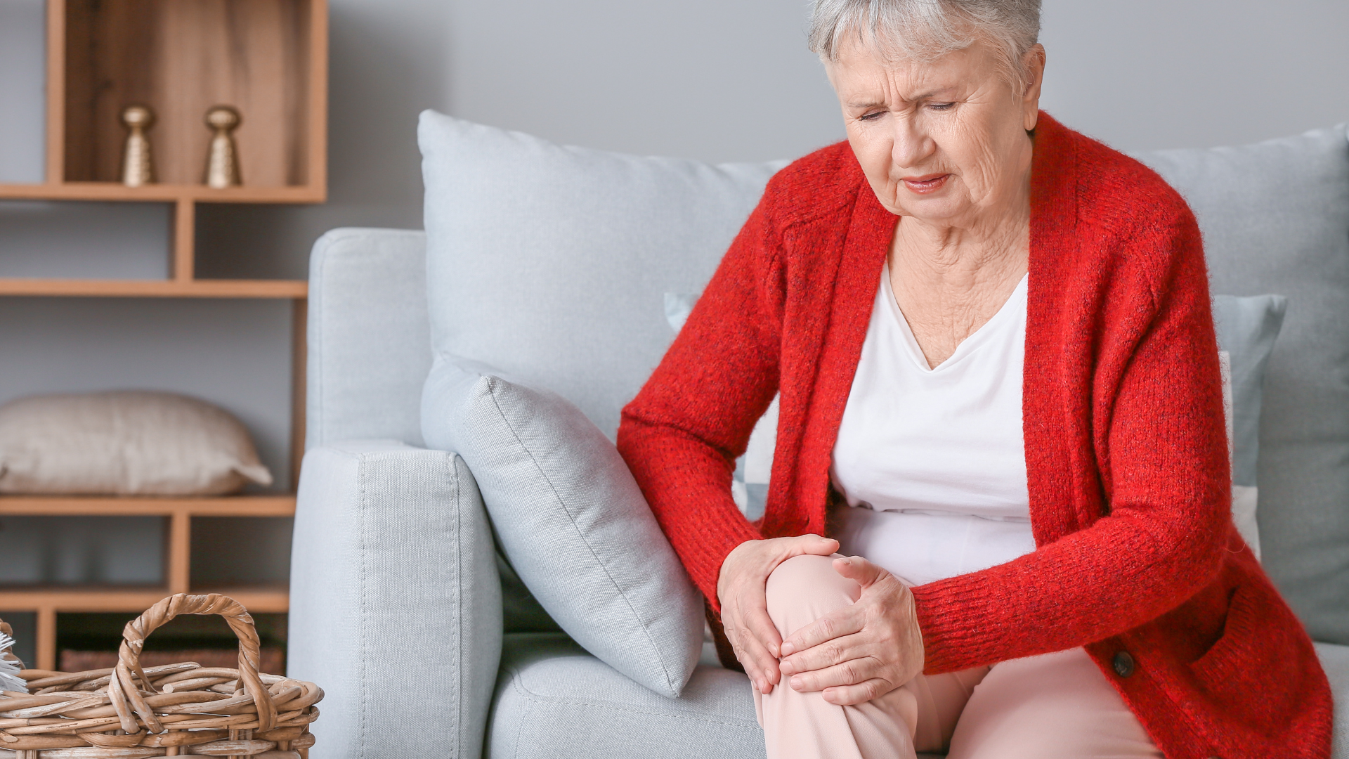 Older woman suffering from osteoarthritis