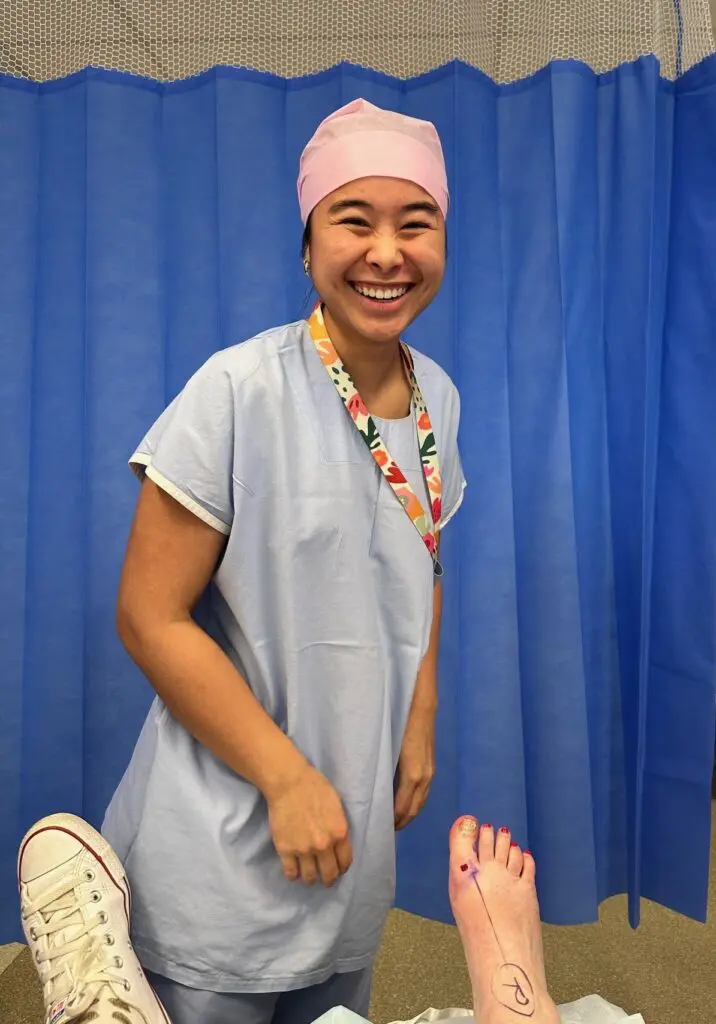 Asian female staff smiling