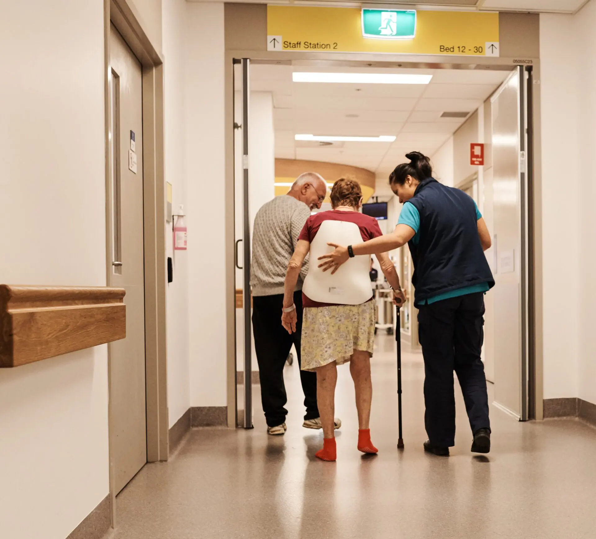 Nurse with elderly woman and husband