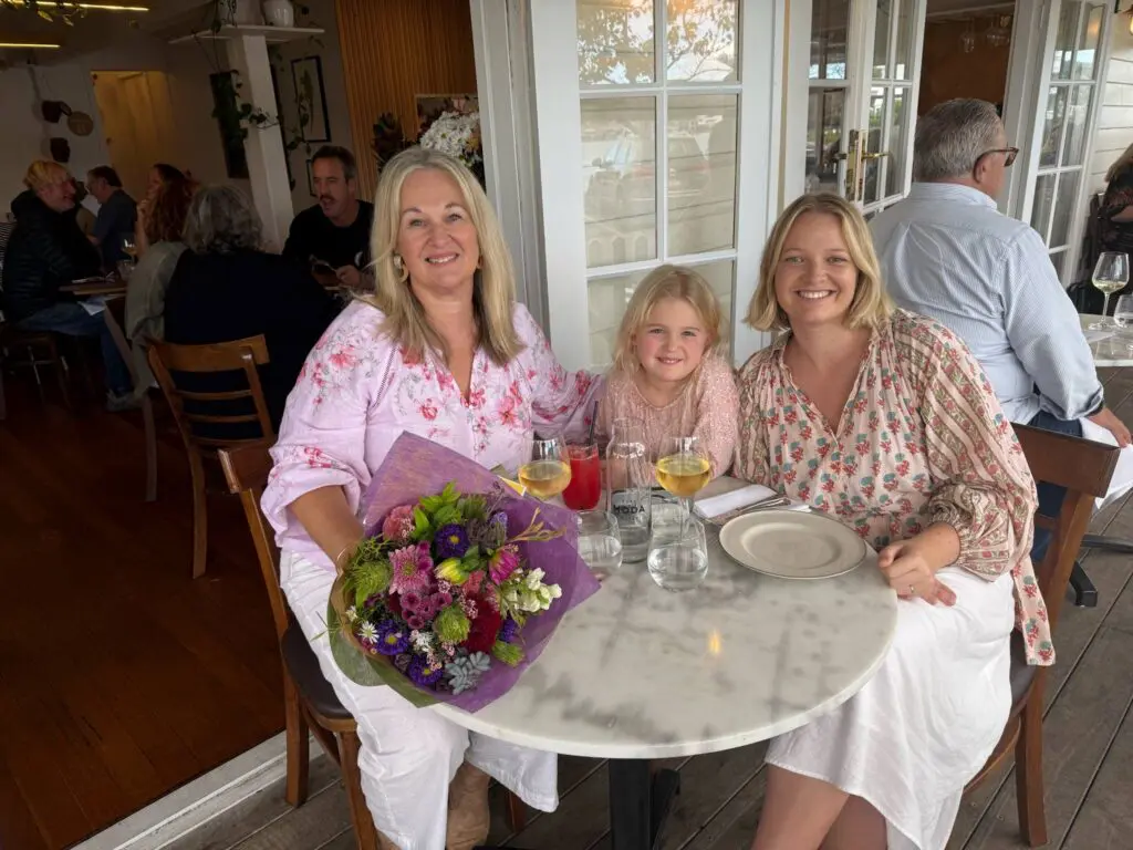 Woman with her daughter and granddaughter
