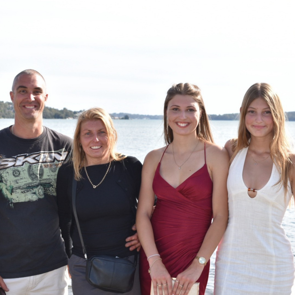 Sharon with her husband and their two daughters