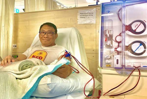 Man receiving dialysis treatment