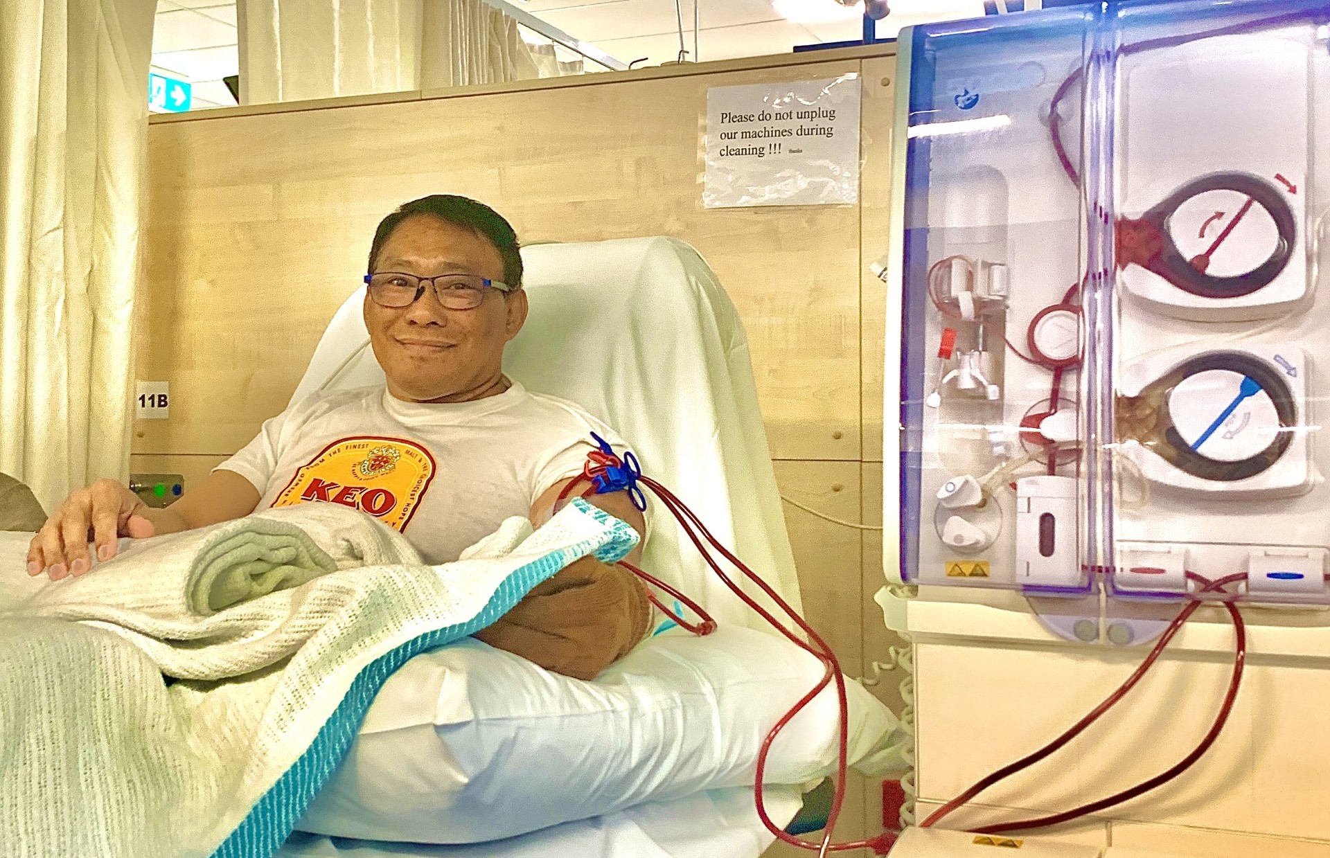 Man receiving dialysis treatment