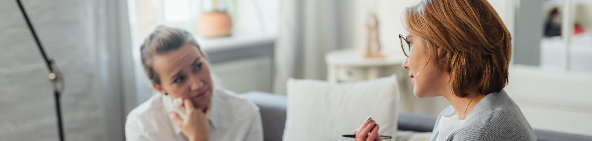 A female therapist chatting to a female patient