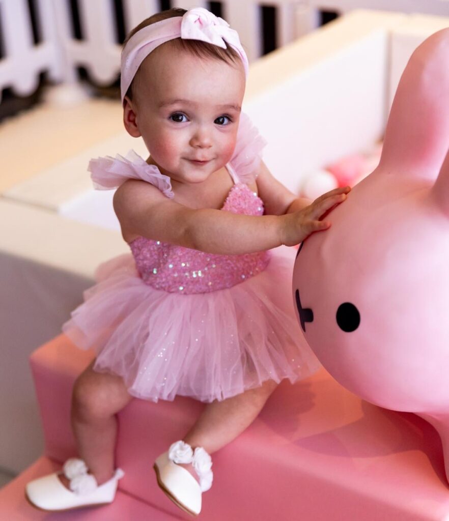 Little girl dressed up in pink
