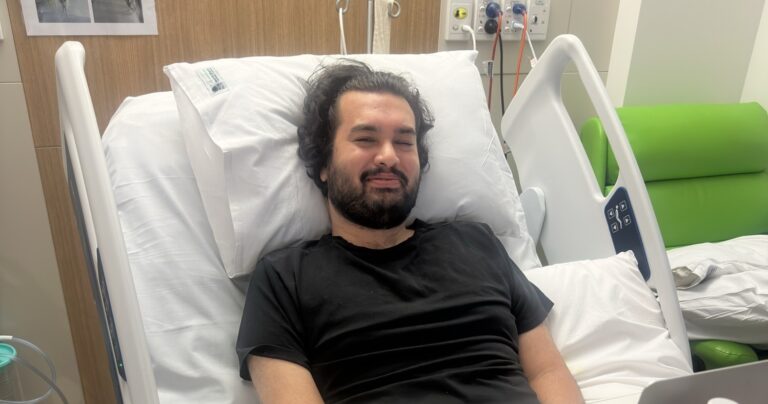 Man lying in a hospital bed