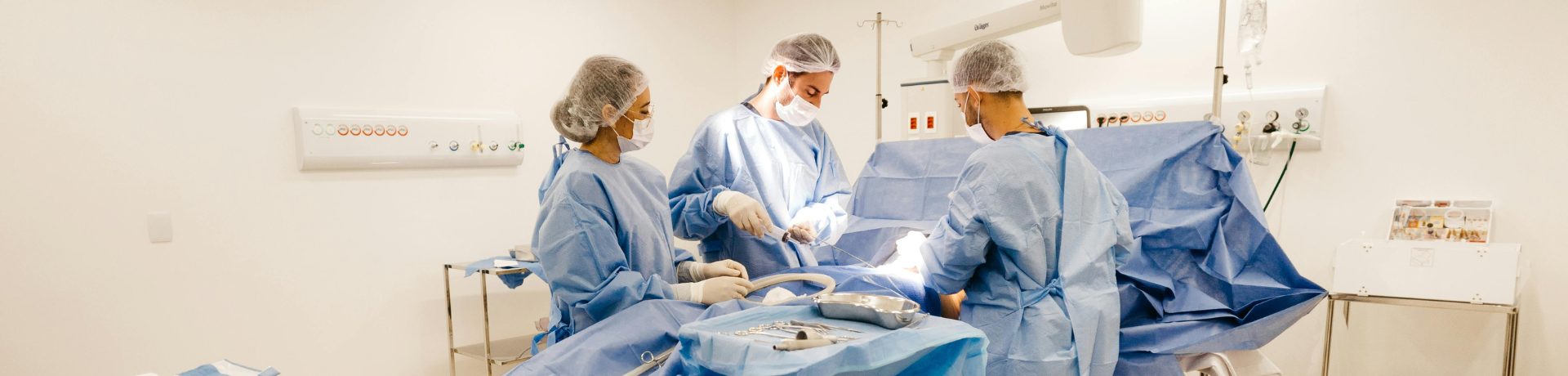 Surgeons in operating theatre