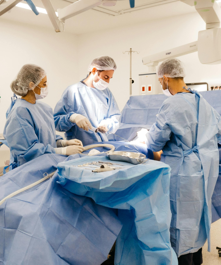Surgeons in operating theatre