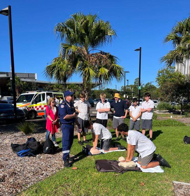 Students practising CPR
